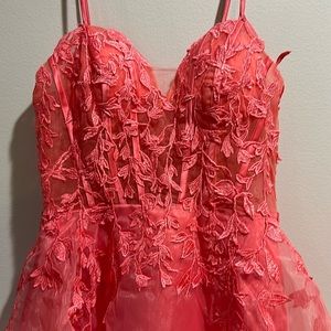 Formal dress. Salmon colored size 2. Never worn.